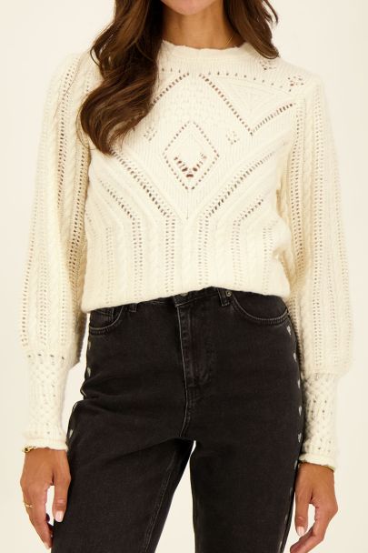 Beige cable sweater with pattern