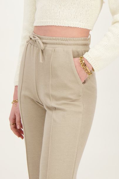 Beige wide leg trousers with pintuck