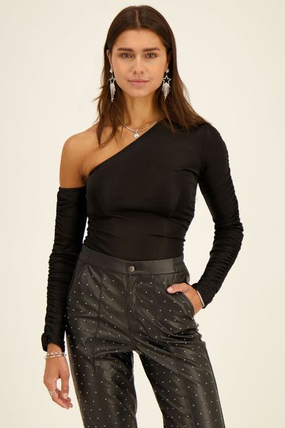 Black one-shoulder draped top with long sleeves