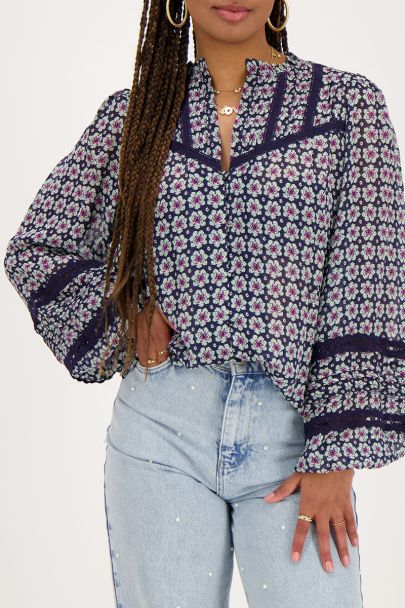 Blue blouse with floral print and tapes