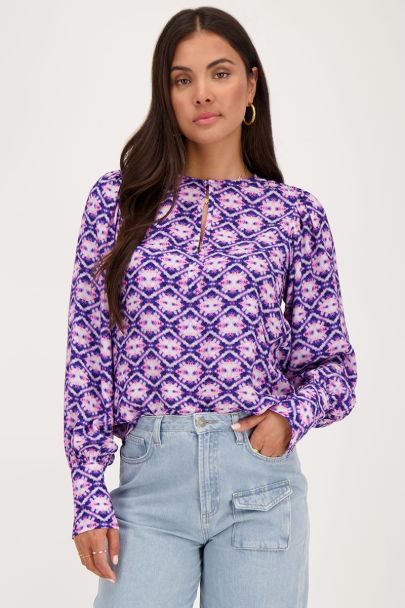 Blauwe blouse met roze print
