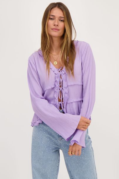 Lilac top with cords and flared sleeves