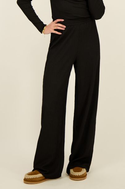 Black wide-leg trousers with texture