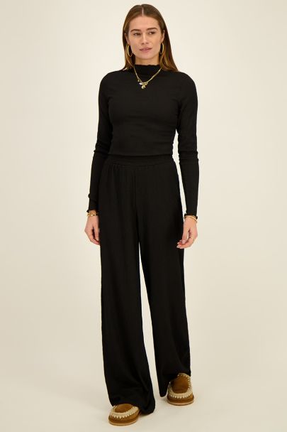 Black wide-leg trousers with texture