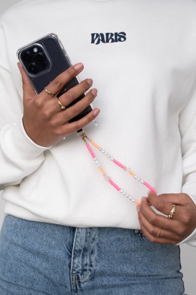 Orange phone cord with pearls