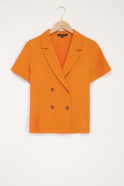 Oranje blouse met dubbele knoop