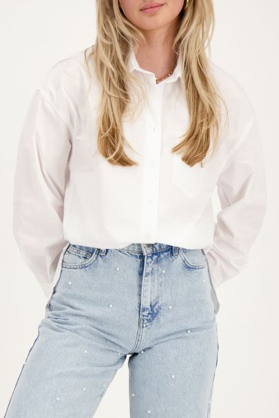 Oversized white blouse with chest pocket