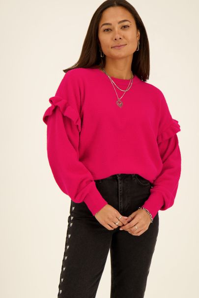 Pink sweater with ruffles