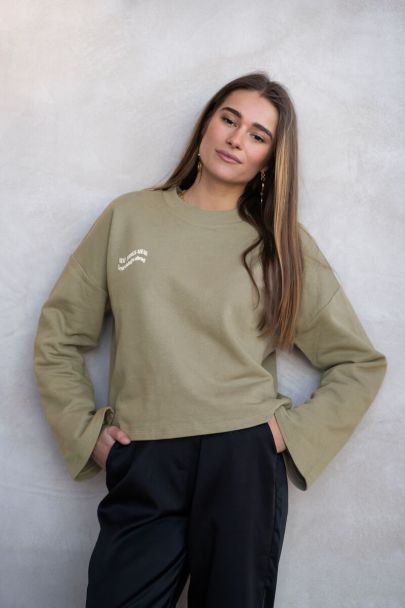 Taupe sweatshirt with wave text