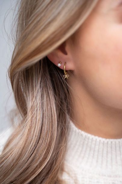 Hoop earrings with bow charm