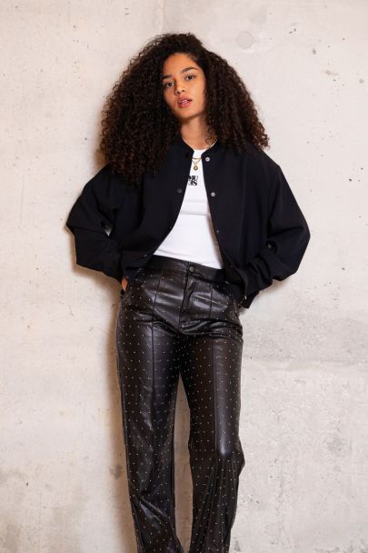 Black straight-leg trousers with studs