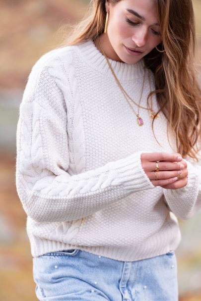 Beige cable knit sweater with texture