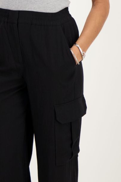 Black cargo trousers with elasticated waistband