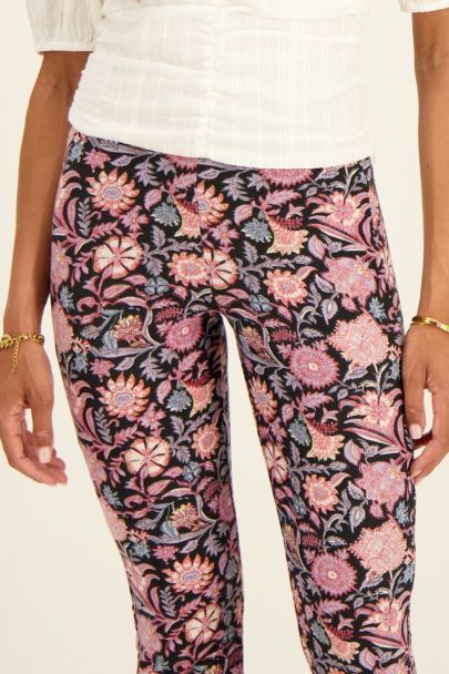 Black flared pants with purple floral print