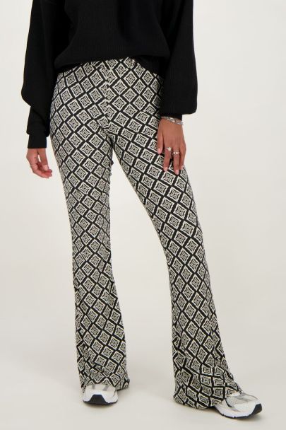 Black flared trousers with Ikat print