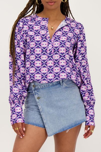 Blauwe blouse met roze print