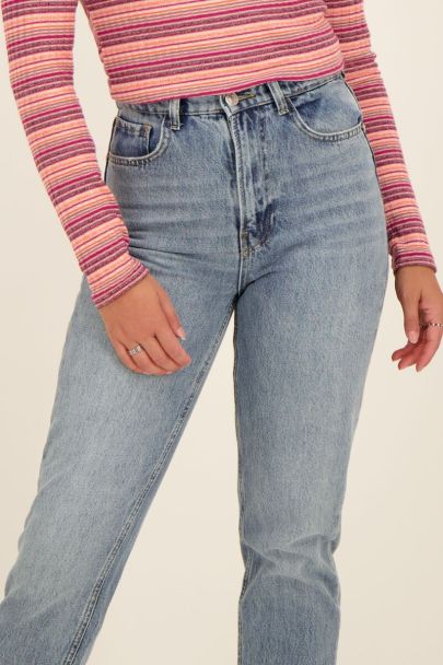 light blue jeans with slit
