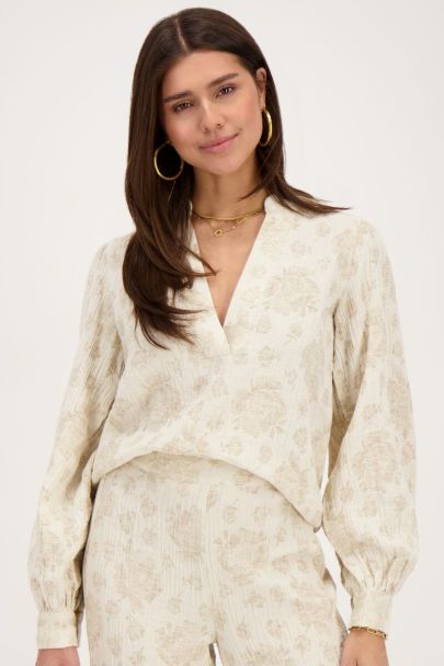 Beige blouse with jacquard flower print