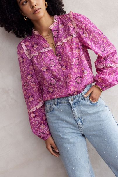 Pink ruffled top with flower print