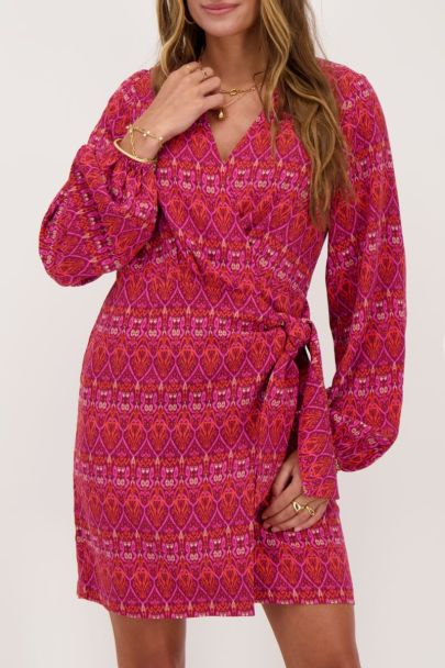 Red wrap dress with Aztec print