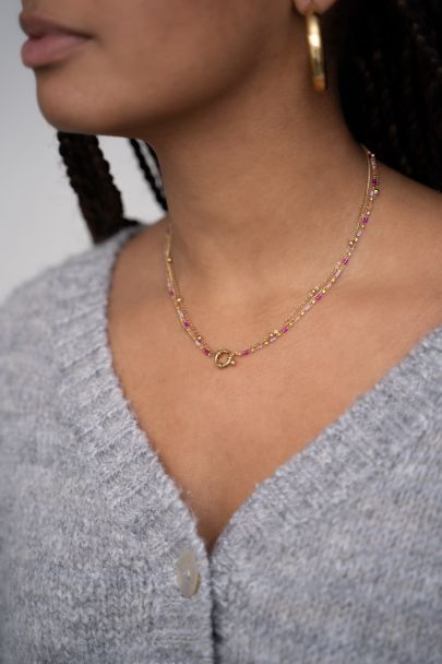 Triple necklace with pink beads