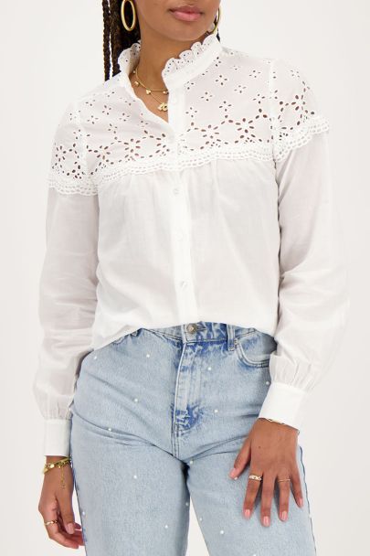 White blouse with embroidery and ruffled collar