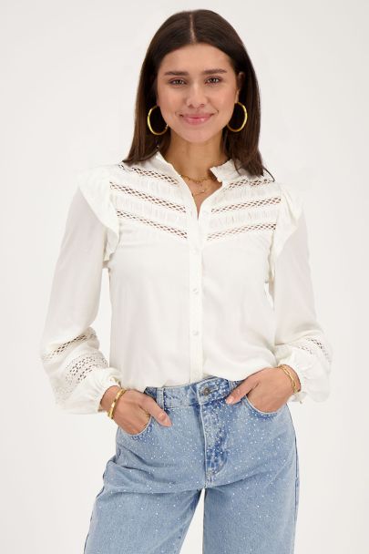 White ruffled blouse with lace tapes 