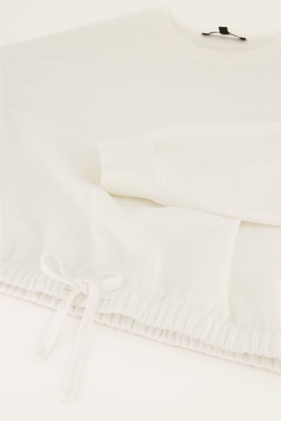 Witte sweater met ruitpatroon